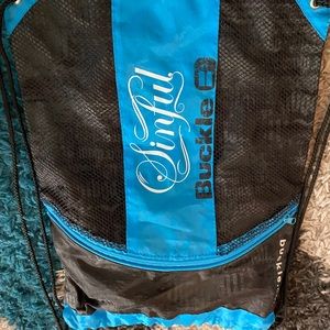 Buckle Sinful sinch sac with angel wings